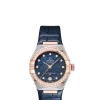 Produktbilde av Omega Constellation Co-Axial Master Chronometer 29MM med blå urskive og blå skinnrem. Ref. O13128292099003.