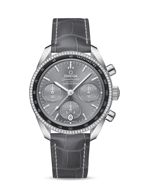 Omega Speedmaster 38 Co‑Axial Chronograph 38 mm med grå tallskive, diamanter på bezel og grå skinnreim. Referanse: 324.38.38.50.06.001