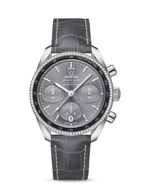 Omega Speedmaster 38 Co‑Axial Chronograph 38 mm med grå tallskive, diamanter på bezel og grå skinnreim. Referanse: 324.38.38.50.06.001