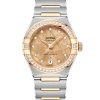 Produktbilde av Omega Constellation 29mm med gullfarget urskive på gull og stållenke. Ref. O13125292099002.