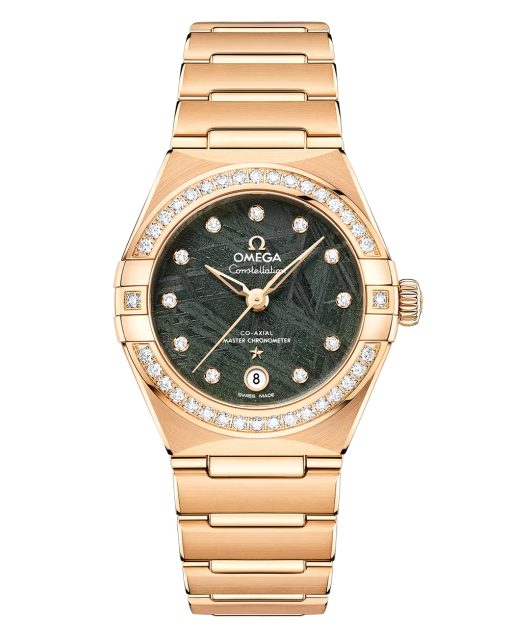 Produktbilde av Omega Constellation Yellow Gold 29mm med grønn urskive på gullenke. Ref. O13155292099005.