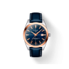 Produktbilde av Tissot Gentleman Powermatic 80 Silicium 18K Gold med blå tallskive og skinnrem. Referanse T927.407.46.041.00