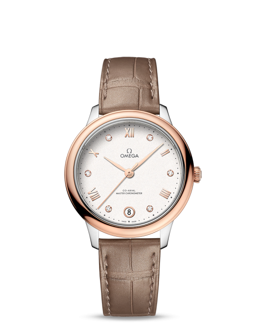 Produktbilde av Omega De Ville Prestige Co-Axial Master Chronometer 34MM med hvit urskive og brun skinnrem. Ref. O43423342052001.