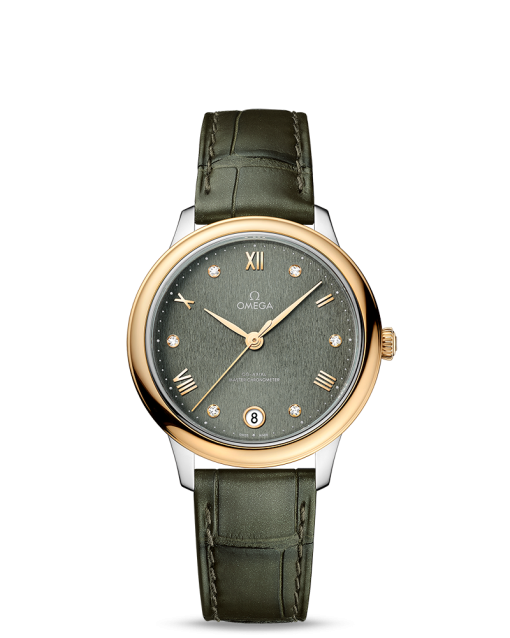 Produktbilde av Omega De Ville Prestige Co-Axial Master Chronometer 34MM med grønn urskive og grønn skinnrem. Ref. O43423342060001.